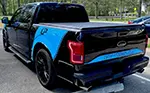 Picture of 2015 Ford F-150 Bedside Banner Rally Stripes Installed By Customer